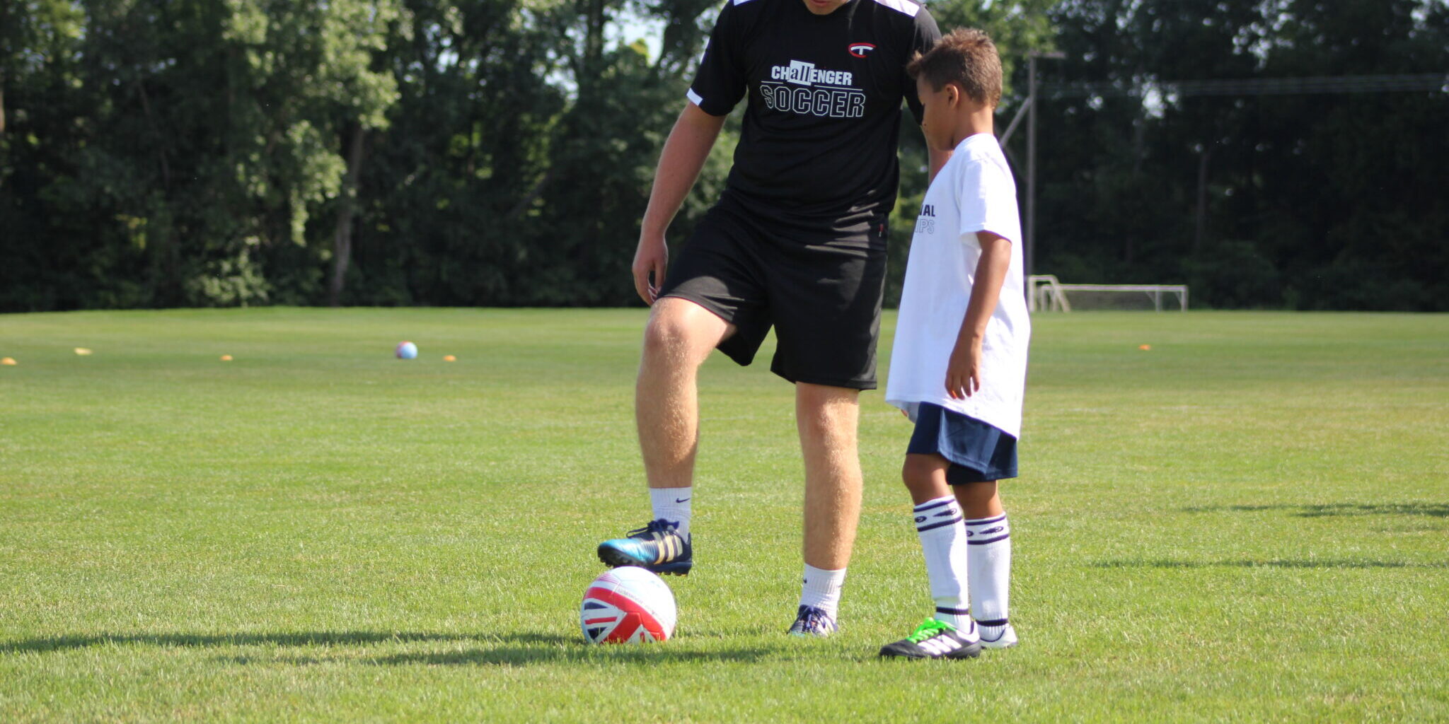 Coach one on one training with young player